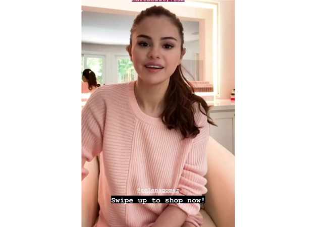 Selena Gomez; Heartloom Selina Sweater; Selena's pink sweater in Instagram Stories